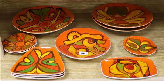 A group of Poole Pottery Delphis orange ground dishes, (11).